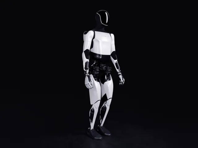 Tesla Optimus humanoid robot standing, on black